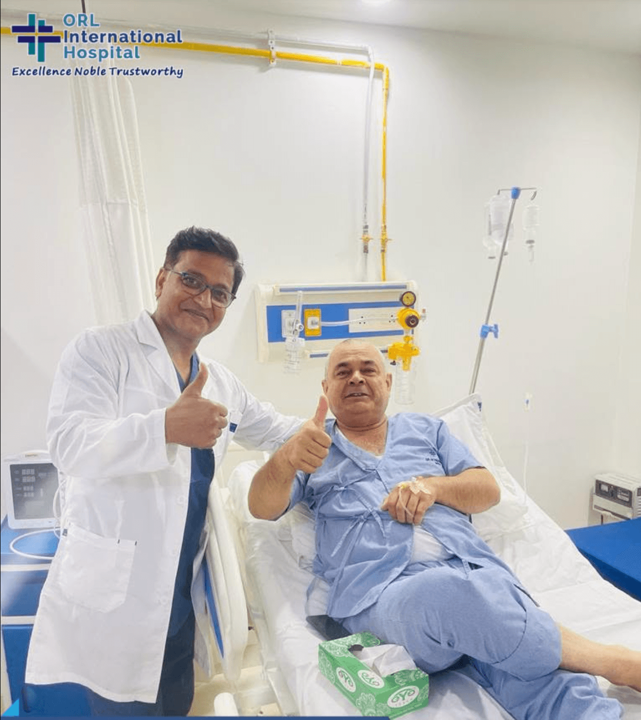 Dr.(Prof.) Dhirendra Singh kushwah examining a patient